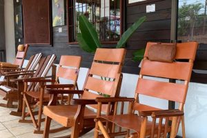 Tico gallery typical wood and leather rocking chairs in Atenas, Costa Rica